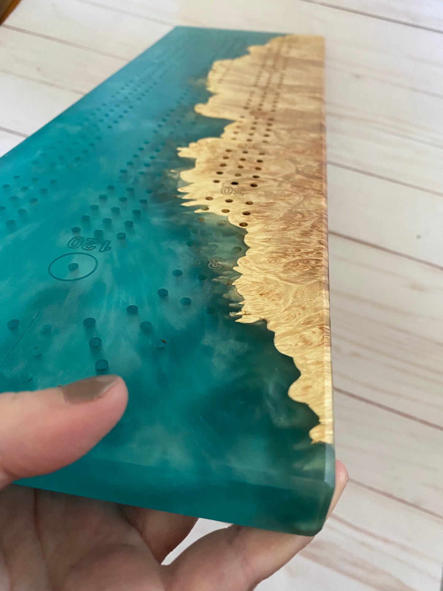 Maple burl with aqua epoxy cribbage board